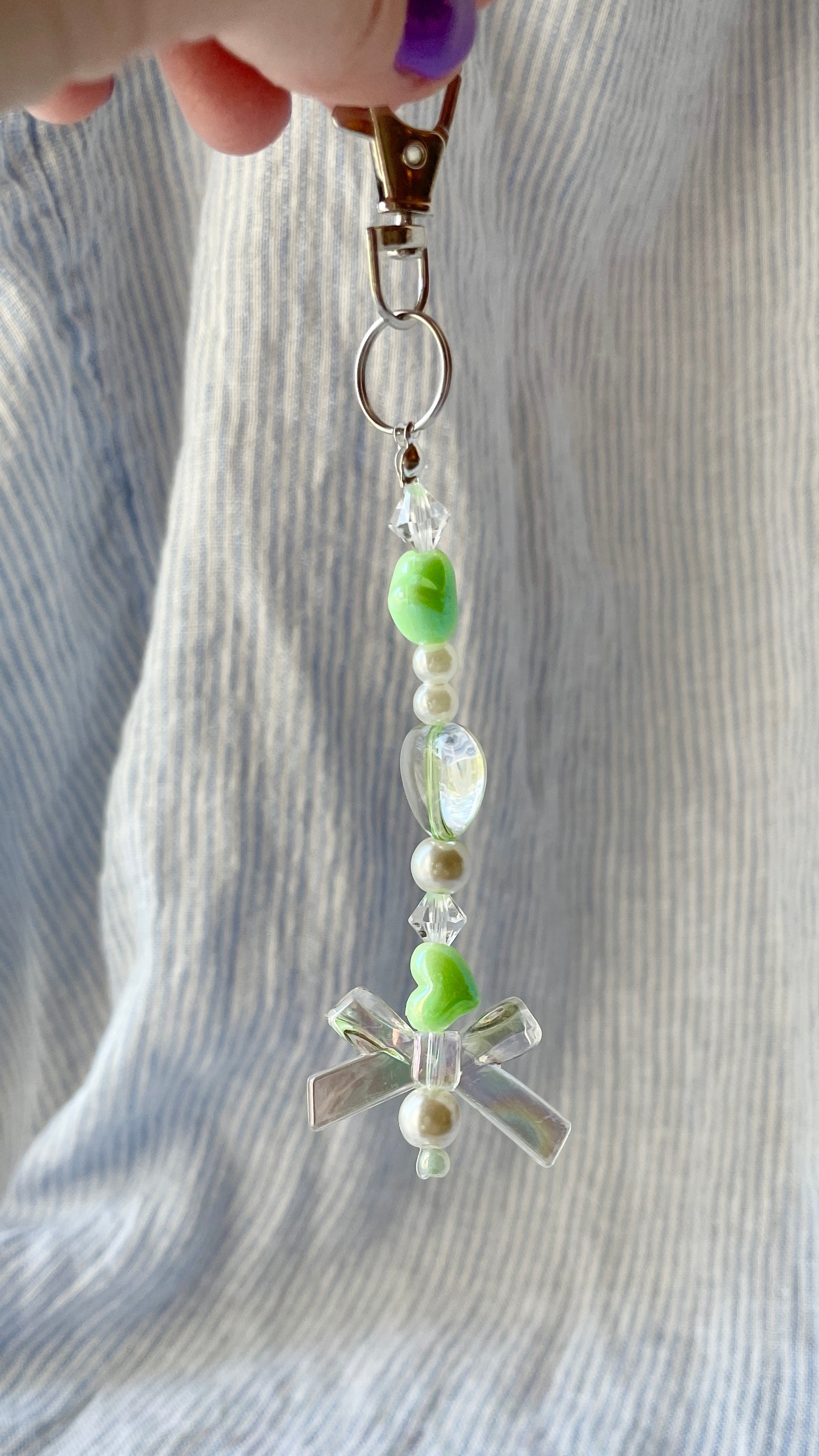 Light green and pearl beaded Bag Charm with hearts and bow charms