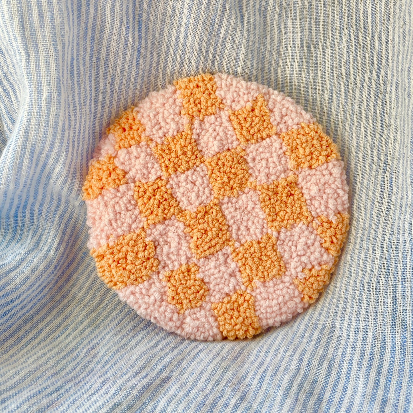 Pink & orange checkered mug coaster