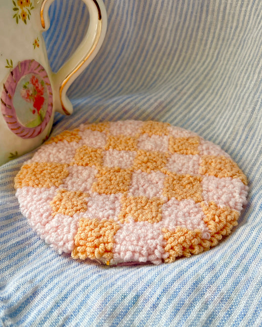 Pink & orange checkered mug coaster