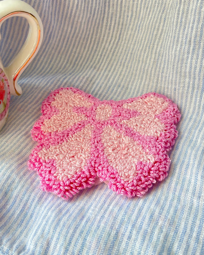 Light pink bow mug coaster
