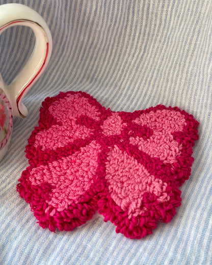 Dark pink bow mug coaster