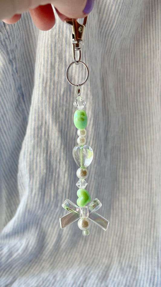 Light green and pearl beaded Bag Charm with hearts and bow charms
